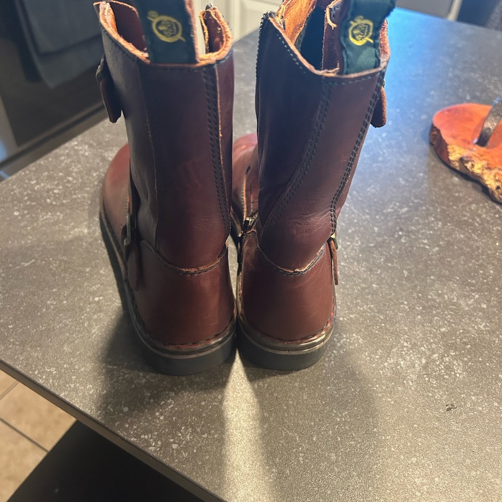 Born burgundy/reddish in color rising boot. - Picture 7 of 8